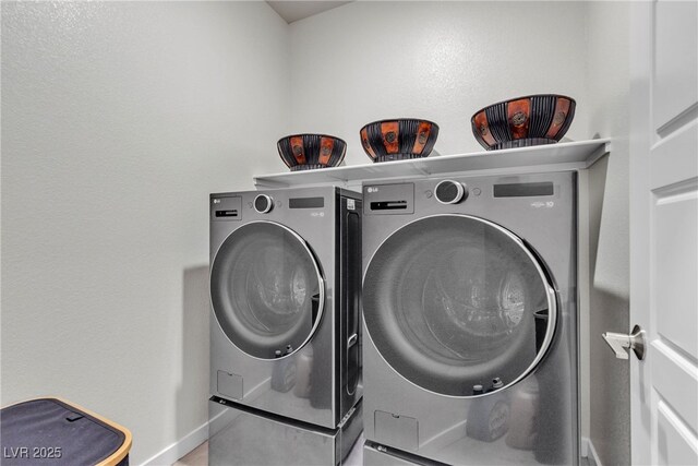 laundry room with independent washer and dryer