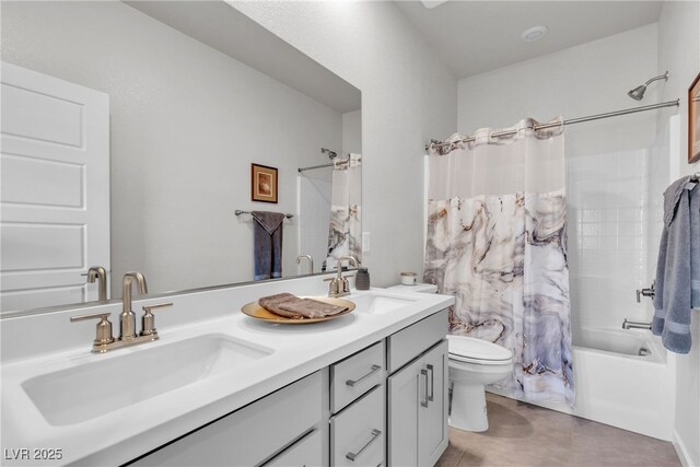 full bathroom with vanity, tile patterned floors, toilet, and shower / bath combo