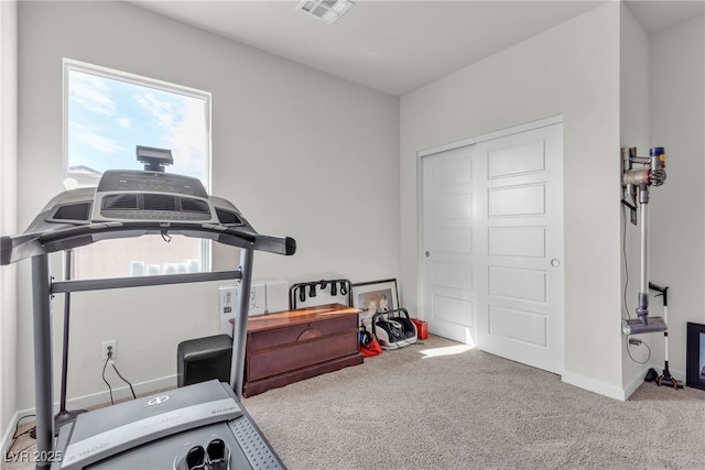 4267 E Highvale Ct, Pahrump, NV 89061 - workout room featuring baseboards, visible vents, and carpet