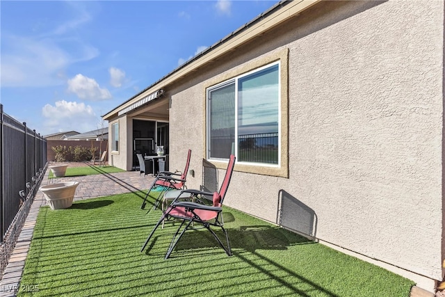 view of yard with a patio area