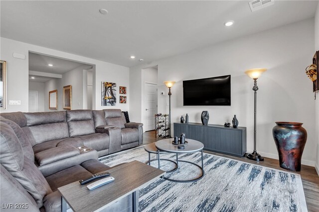 living room featuring dark hardwood / wood-style flooring