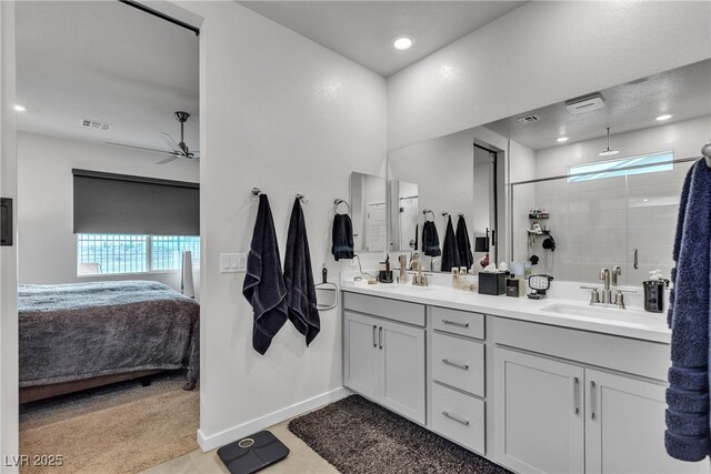 bathroom with ceiling fan, vanity, and an enclosed shower