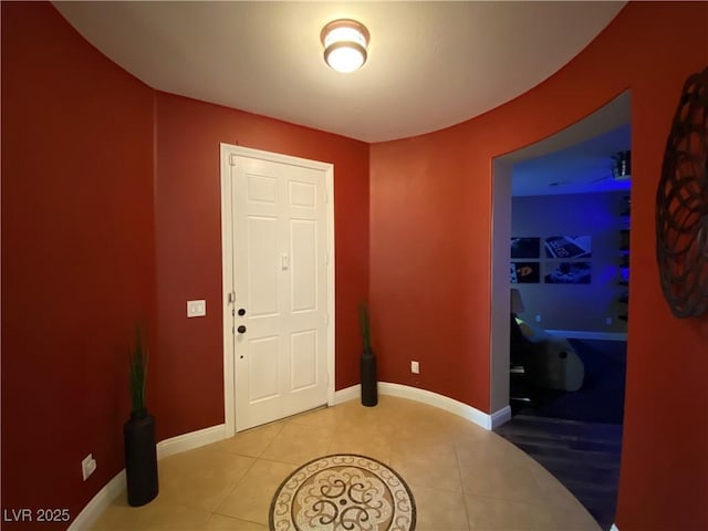 entrance foyer featuring light tile patterned floors