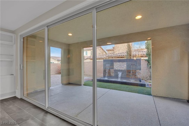 doorway featuring recessed lighting