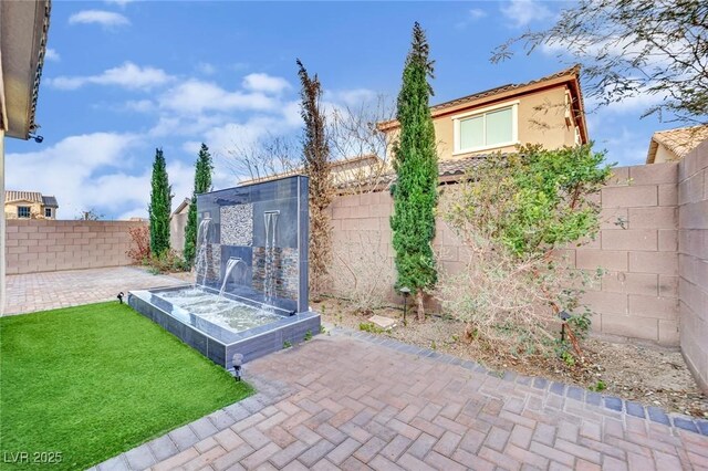 view of patio / terrace with a fenced backyard