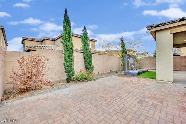 view of patio with a fenced backyard