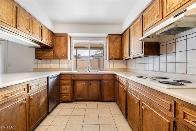 kitchen with sink, tasteful backsplash, white electric cooktop, light tile patterned floors, and dishwasher