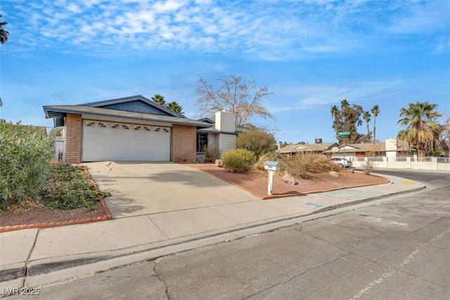 ranch-style home with a garage