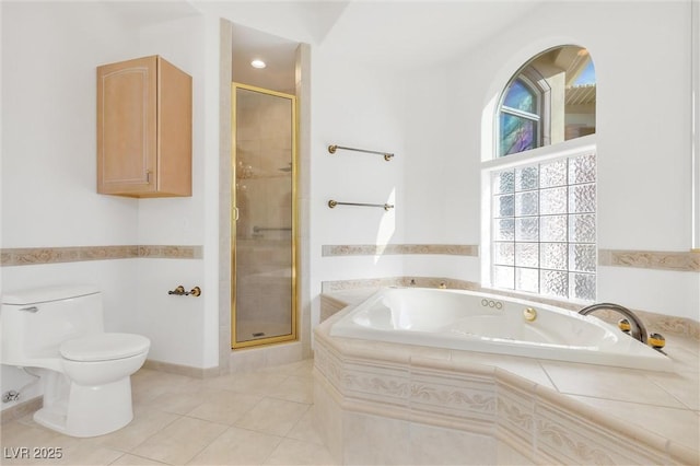 bathroom featuring independent shower and bath, tile patterned flooring, and toilet