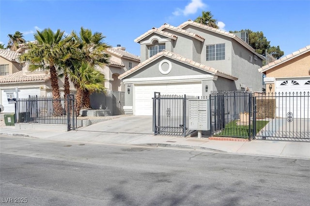 view of front of property featuring a garage, fence private yard, driveway, and stucco siding
