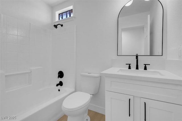 full bath with toilet, shower / bathtub combination, baseboards, wood finished floors, and vanity