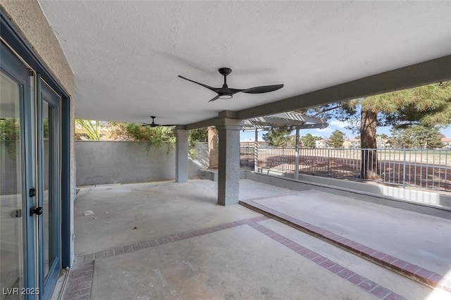 view of patio / terrace featuring ceiling fan