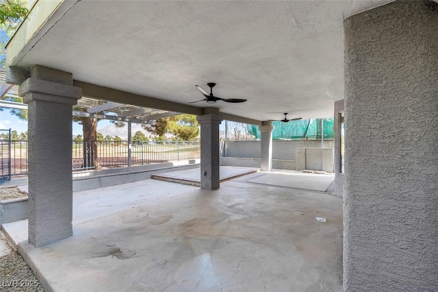 view of patio / terrace featuring fence