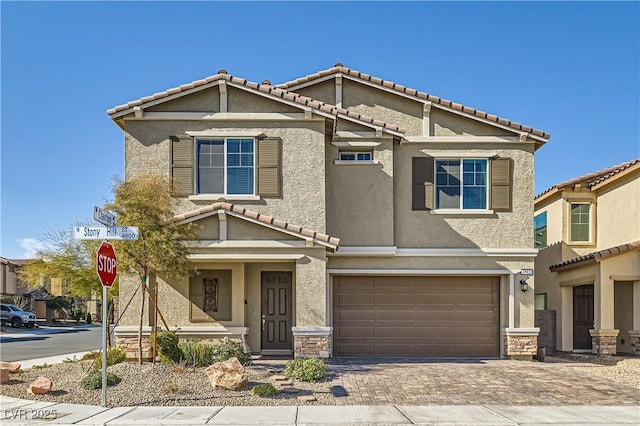 view of front of property with a garage