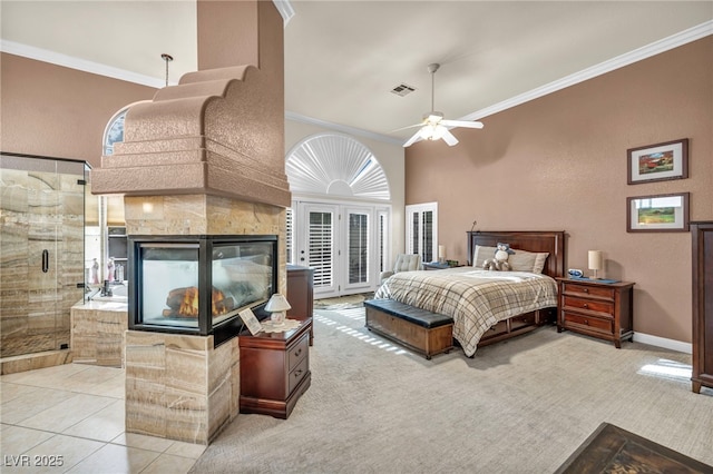 carpeted bedroom featuring access to outside, visible vents, and crown molding