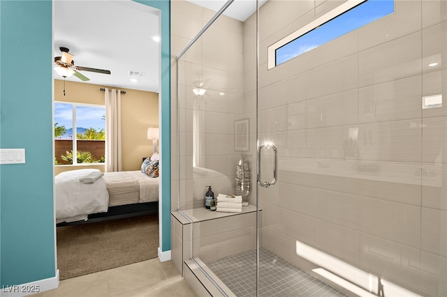 bathroom featuring tile patterned flooring, plenty of natural light, and ceiling fan