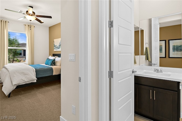 carpeted bedroom with sink