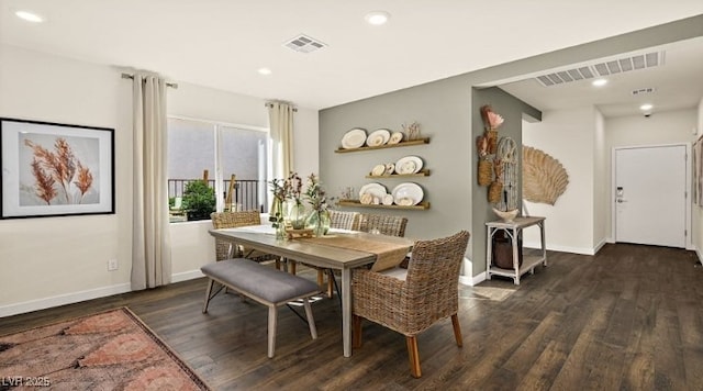 dining room featuring dark wood-type flooring