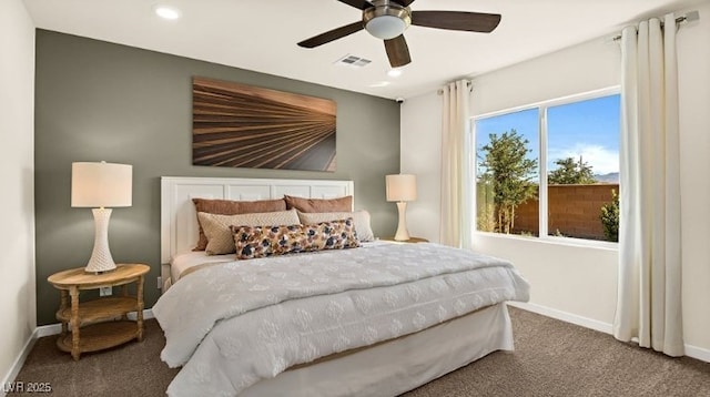 carpeted bedroom with ceiling fan