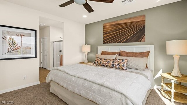 bedroom featuring light colored carpet and ceiling fan