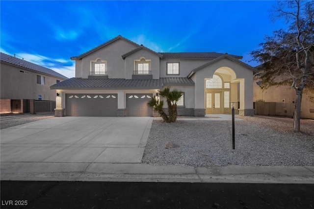 view of front of property with a garage