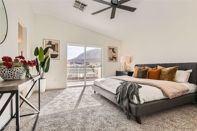 bedroom featuring lofted ceiling, carpet, access to exterior, ceiling fan, and a mountain view