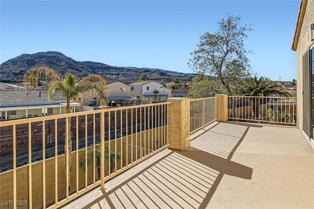 balcony featuring a mountain view