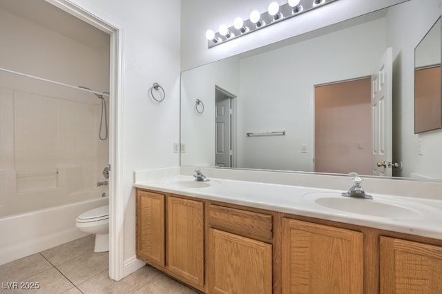 full bathroom featuring  shower combination, toilet, tile patterned flooring, and vanity