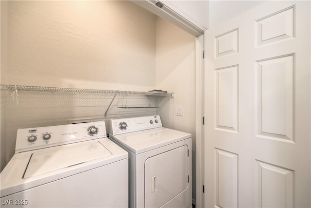 laundry room with washer and clothes dryer