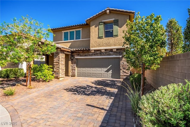 view of front of home with a garage