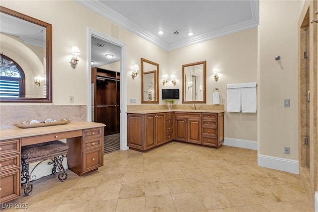 bathroom with vanity, tile patterned floors, ornamental molding, and walk in shower