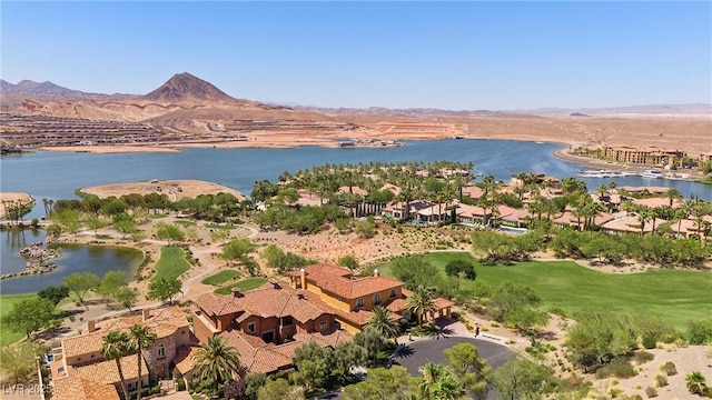 bird's eye view featuring a water and mountain view