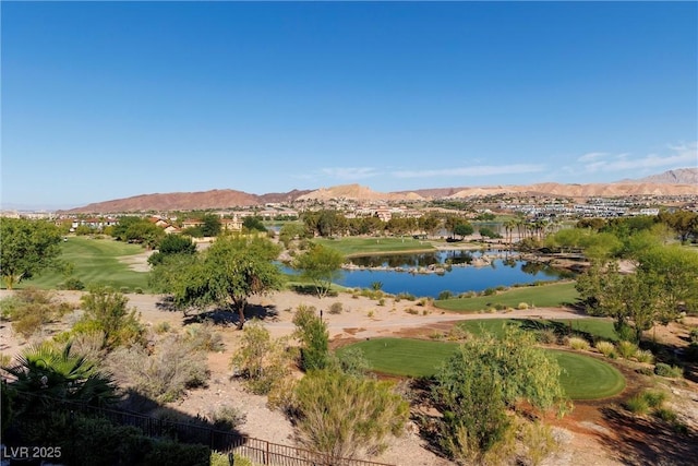 birds eye view of property featuring a water and mountain view