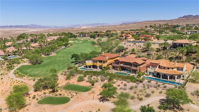 birds eye view of property featuring a mountain view