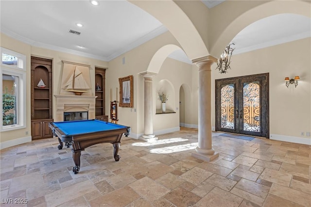 rec room with billiards, crown molding, decorative columns, and french doors