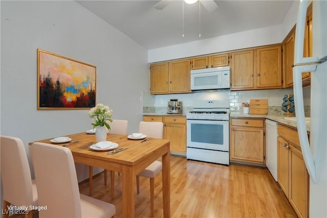 kitchen featuring tasteful backsplash, white appliances, ceiling fan, and light hardwood / wood-style flooring