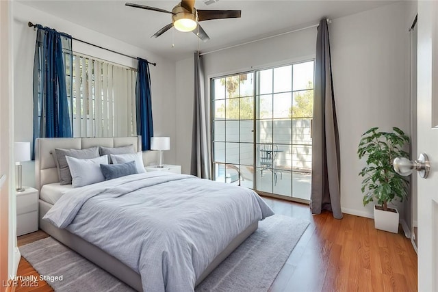 bedroom featuring ceiling fan and light hardwood / wood-style floors