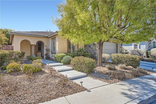 view of front of property featuring a garage