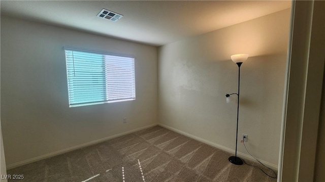 view of carpeted spare room