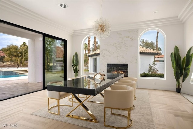 sunroom / solarium with a fireplace