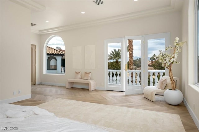 bedroom featuring access to outside and light parquet flooring