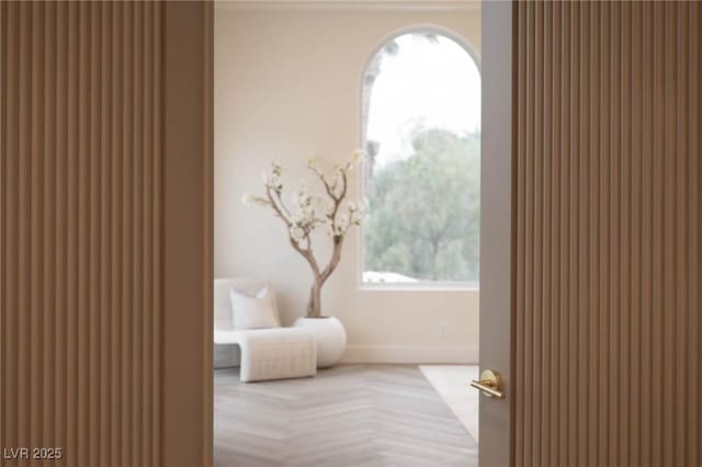 bedroom with light parquet flooring