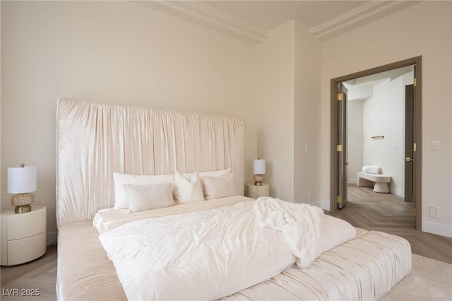 bedroom with light parquet floors