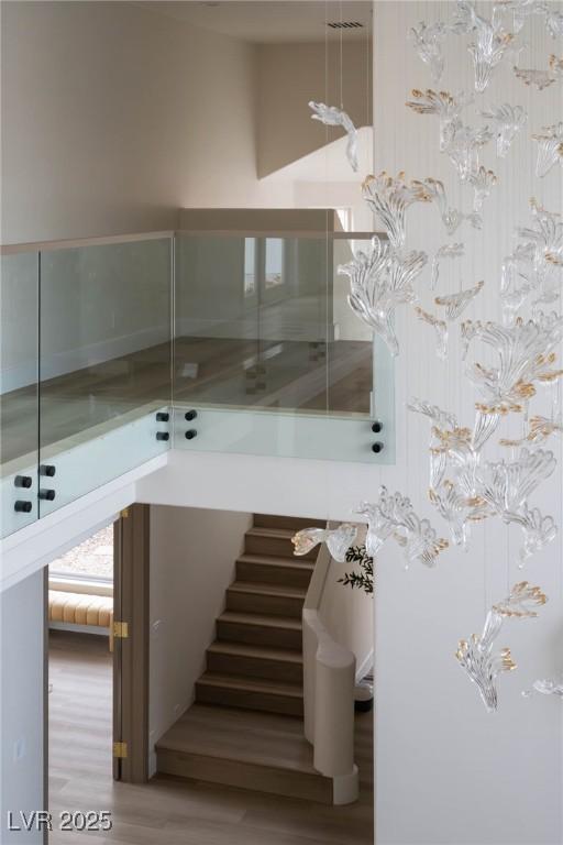 74 Innisbrook Ave, Las Vegas, NV 89113 - staircase featuring wood finished floors