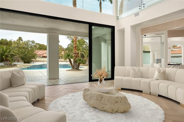 74 Innisbrook Ave, Las Vegas, NV 89113 - living area featuring a towering ceiling and visible vents