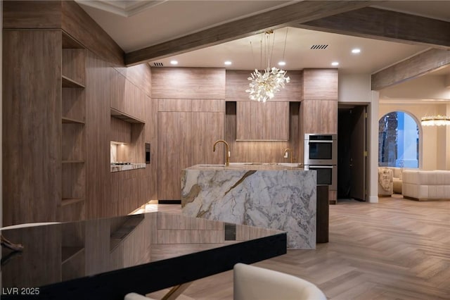 74 Innisbrook Ave, Las Vegas, NV 89113 - reception area featuring a sink and a chandelier