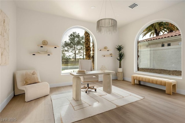 74 Innisbrook Ave, Las Vegas, NV 89113 - office area with baseboards, wood finished floors, and visible vents