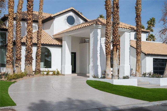 74 Innisbrook Ave, Las Vegas, NV 89113 - view of front of property featuring a tiled roof and stucco siding