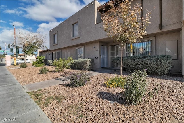 view of property with stucco siding