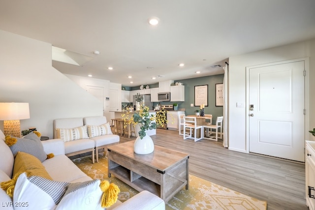 living room with light wood-type flooring